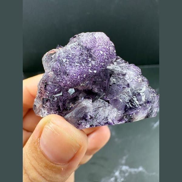 Purple fluorite cubes with darker framed edges — alternate view