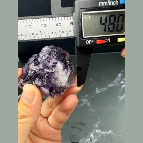 Purple fluorite cubes with darker framed edges — alternate view