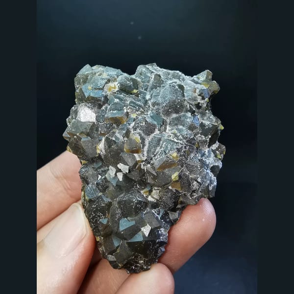Sugary garnet crystal cluster — complete view