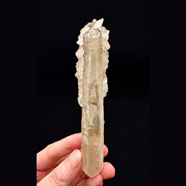Slender quartz crystal with clear petal calcite from Inner Mongolia — alternate view