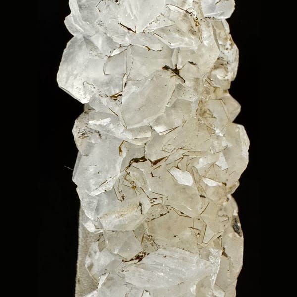 Slender quartz crystal with clear petal calcite from Inner Mongolia — detail view