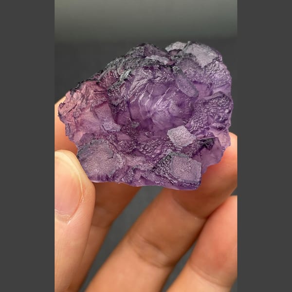 Eggplant-purple fluorite from Henan — complete view