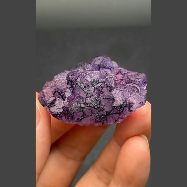 Eggplant-purple fluorite from Henan — detail view