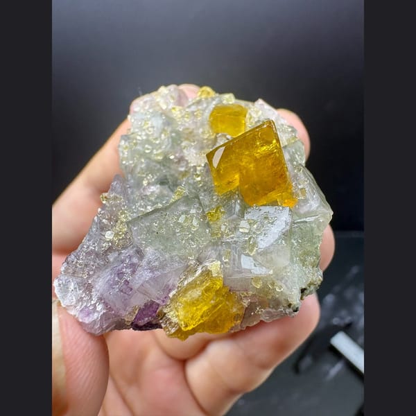 Golden yellow barite crystals on pale green fluorite from Ruijin — alternate view