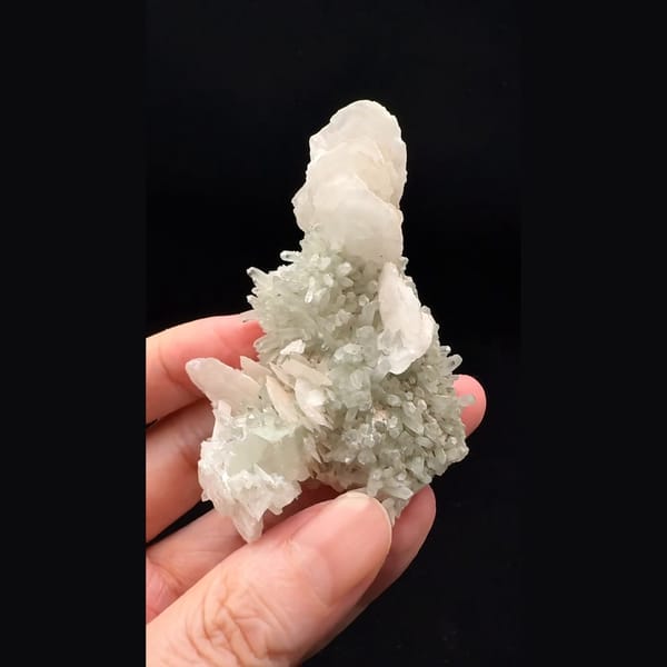 Green quartz with pale pink layered calcite from Huanggangliang — detail view