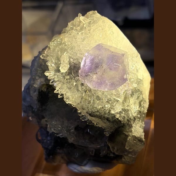 Large blue fluorite crystal on quartz cluster from Fujian — alternate view