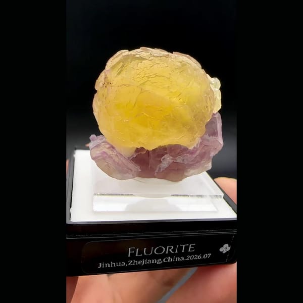Yellow fluorite ball on purple fluorite from Zhejiang — alternate view
