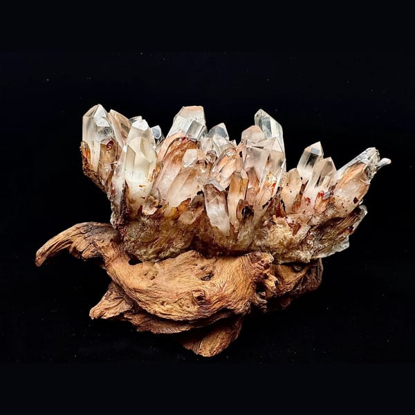 Large clear quartz cluster with red iron coating from Madagascar — complete view