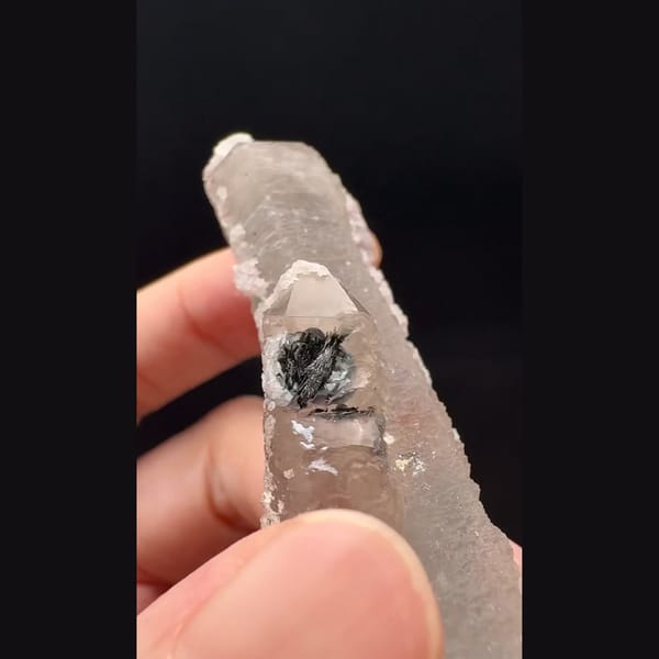 Double-terminated quartz with pink calcite and hematite rosette from Inner Mongolia — alternate view