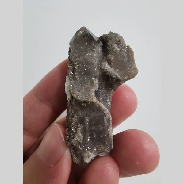 Finely sparkling quartz cluster — complete view
