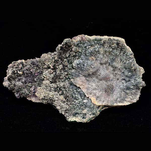 Pale amethyst flower rosettes on grey matrix from Brazil — complete view