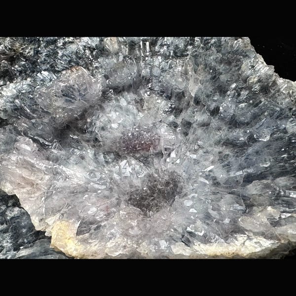 Pale amethyst flower rosettes on grey matrix from Brazil — alternate view
