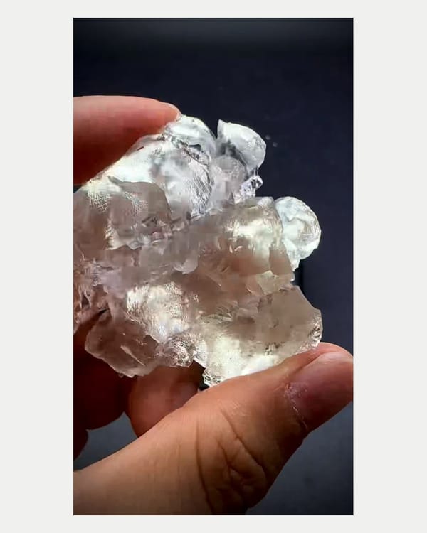 Complete left oblique view of naturally etched fluorite crystal