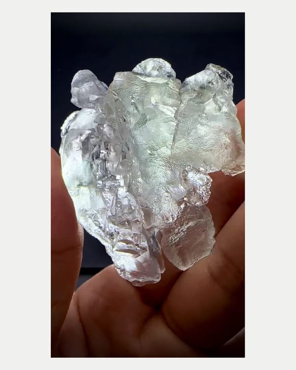 Complete right oblique view of naturally etched fluorite crystal