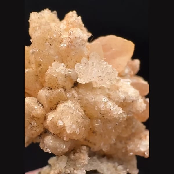 Orange-pink sugar-coated quartz flower from Namibia — detail view