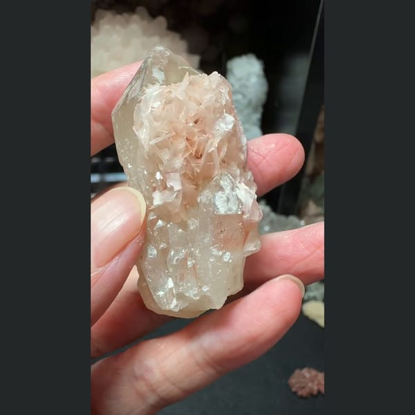 Quartz crusted with pink petal calcite from Inner Mongolia — detail view