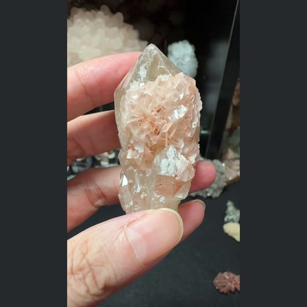 Quartz crusted with pink petal calcite from Inner Mongolia — detail view
