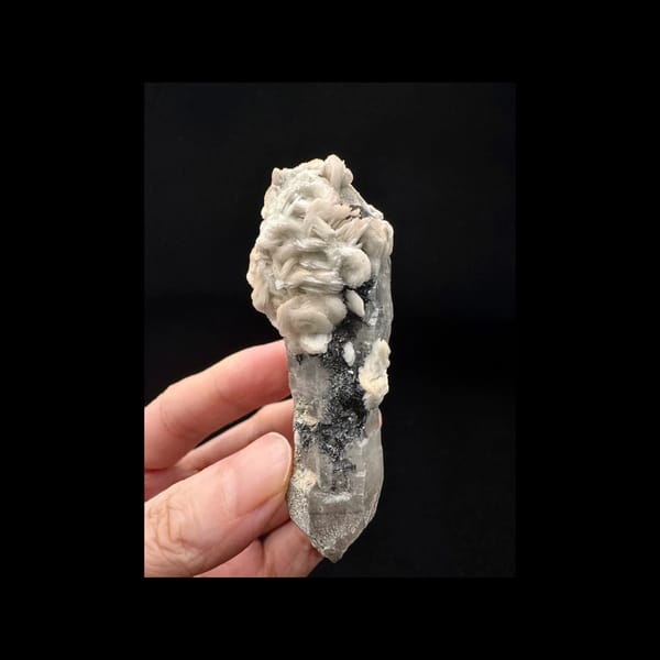 Double-terminated quartz with white calcite petals and dark hematite from Inner Mongolia — complete front view