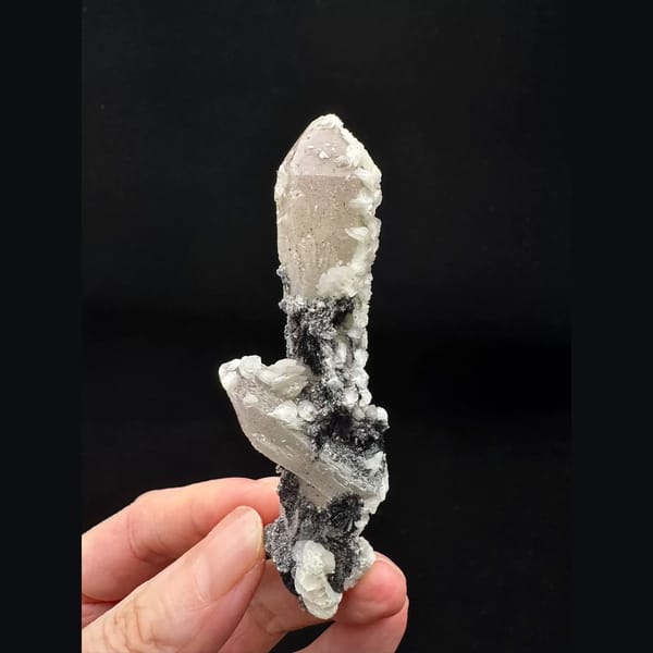 Double-terminated quartz with white calcite and specular hematite from Inner Mongolia — complete view