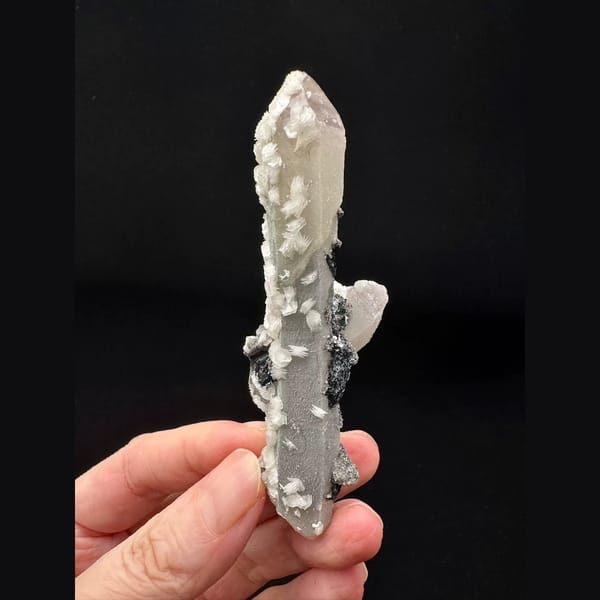 Double-terminated quartz with white calcite and specular hematite from Inner Mongolia — alternate view