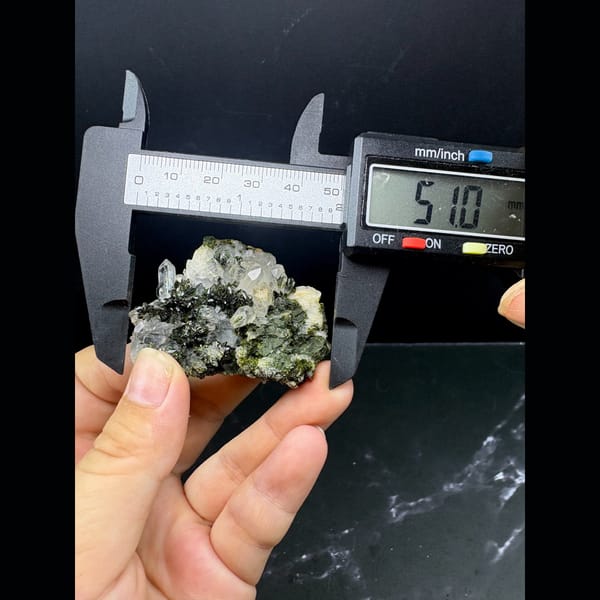 Dark green epidote crystals with clear quartz from Yunnan — alternate view