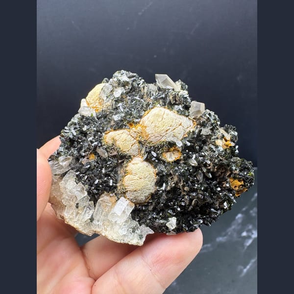 Pale prehnite clusters with dark epidote and quartz from Yunnan — alternate view