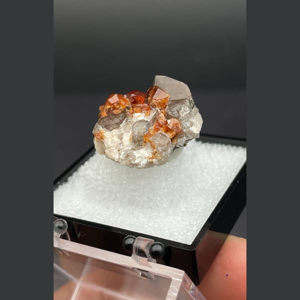 Garnet with smoky quartz from Fujian — detail view