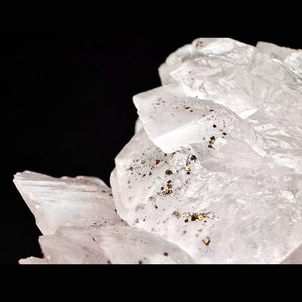 Pale pink petal calcite with pyrite from Shizhuyuan, Hunan — detail view