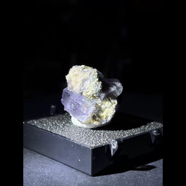 Purple fluorite with pyrite and mica from Yaogangxian — detail view