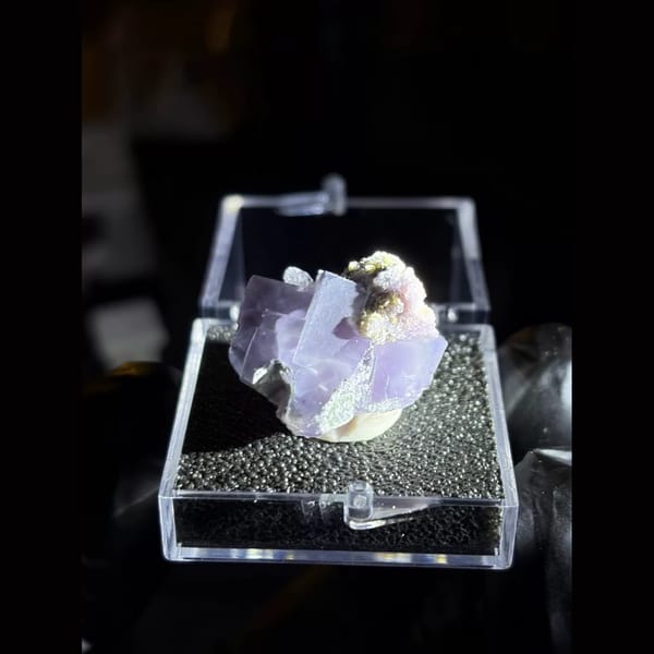 Purple fluorite with pyrite and mica from Yaogangxian — detail view