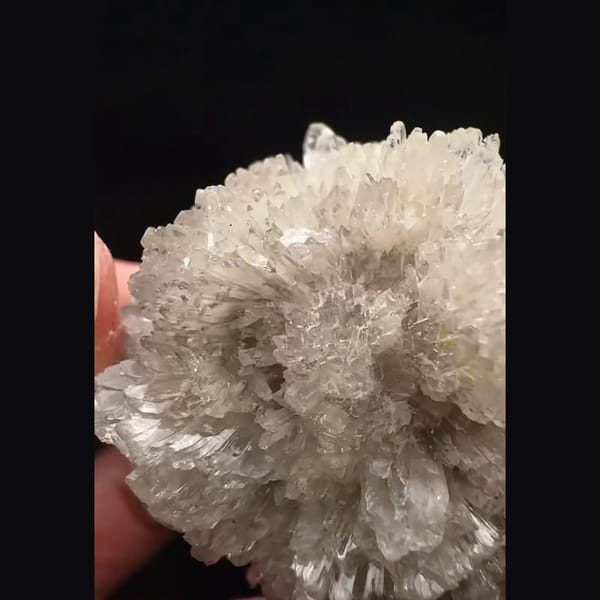 Ball of radiating glassy creedite crystals from Guizhou — alternate view