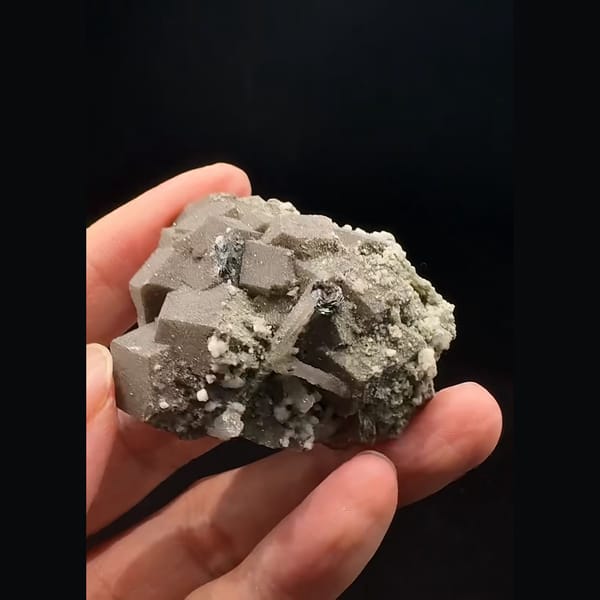 Brown andradite garnet with quartz and calcite from Inner Mongolia — alternate view