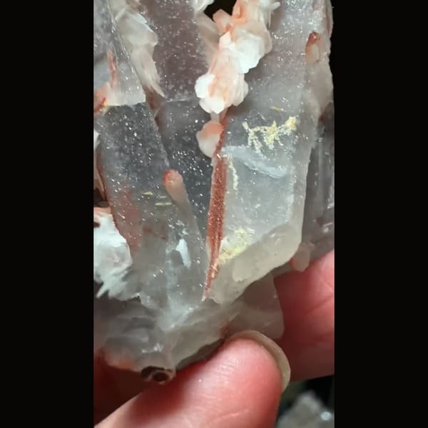 Sparkly quartz with salmon-pink petal calcite from Inner Mongolia — detail view