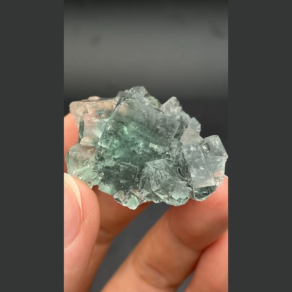 Glassy blue-green seaweed fluorite from Hunan — complete view