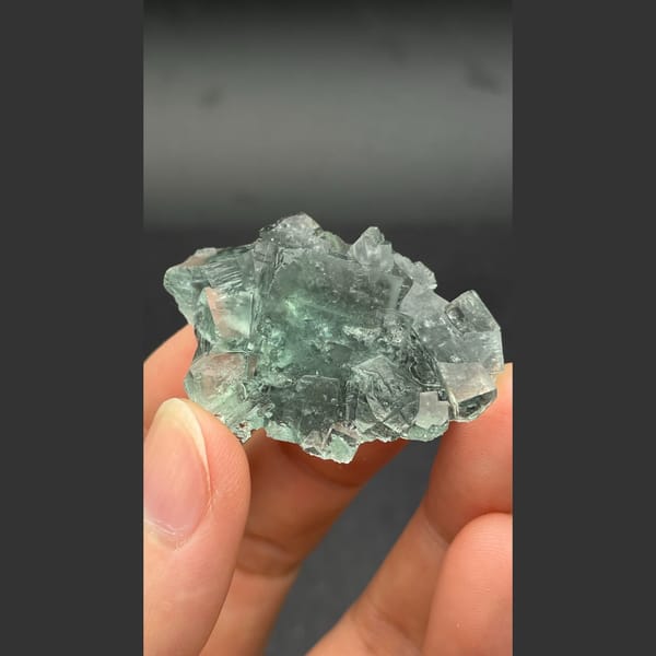 Glassy blue-green seaweed fluorite from Hunan — detail view