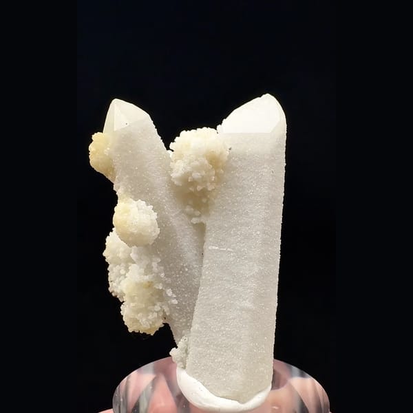 Sparkly white quartz with cream calcite balls from Inner Mongolia — detail view