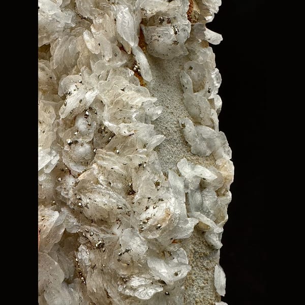 Broad sparkly quartz with white petal calcite and pyrite from Inner Mongolia — detail view