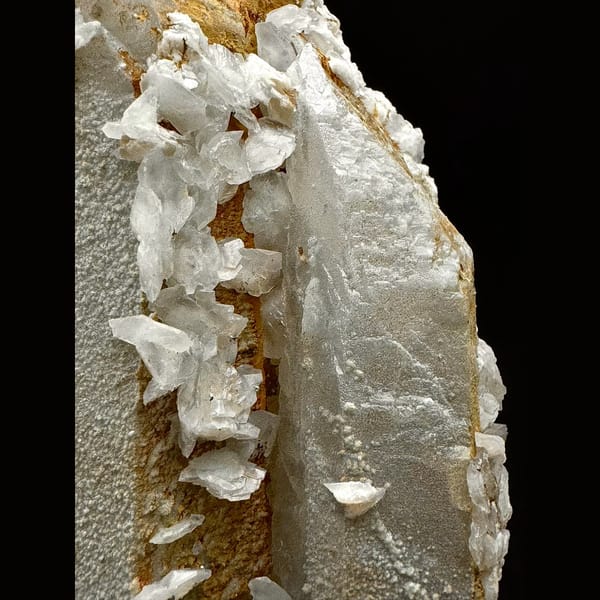Broad sparkly quartz with white petal calcite and pyrite from Inner Mongolia — detail view