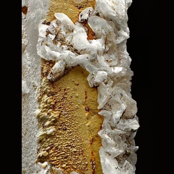Broad sparkly quartz with white petal calcite and pyrite from Inner Mongolia — detail view