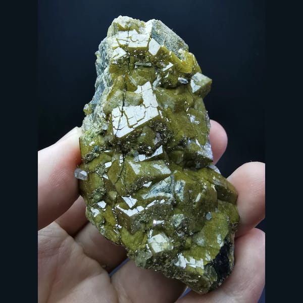 Golden-yellow garnet with secondary growth faces — alternate view
