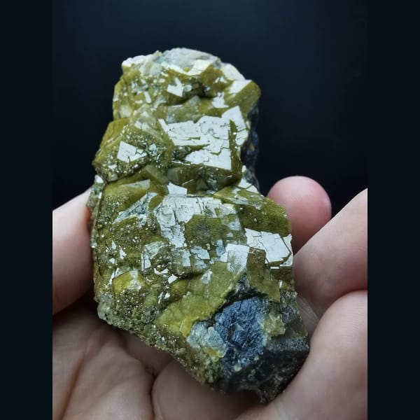 Golden-yellow garnet with secondary growth faces — alternate view