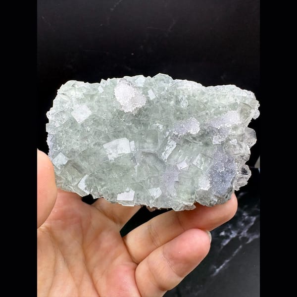 Icy glassy blue-purple fluorite plate with quartz from Fujian — detail view