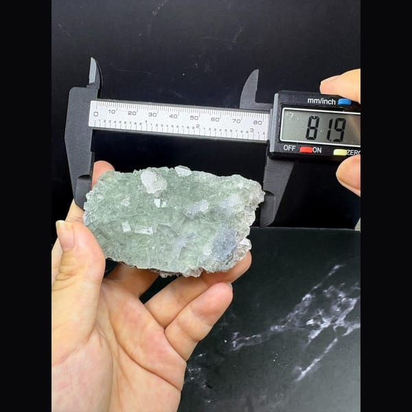 Icy glassy blue-purple fluorite plate with quartz from Fujian — detail view