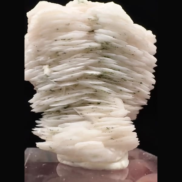 Pale pink layered calcite from Inner Mongolia — detail view