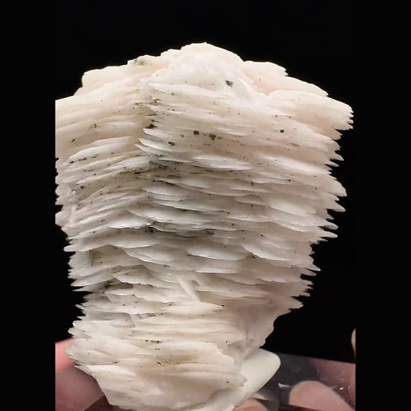 Pale pink layered calcite from Inner Mongolia — detail view
