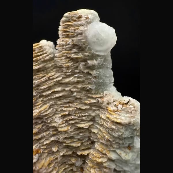 Small layered calcite floater from Inner Mongolia — detail view
