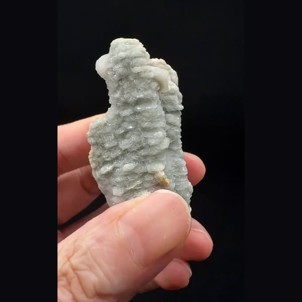 Small layered calcite floater from Inner Mongolia — detail view