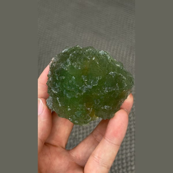 Large stepped apple green fluorite cluster from Henan — complete view