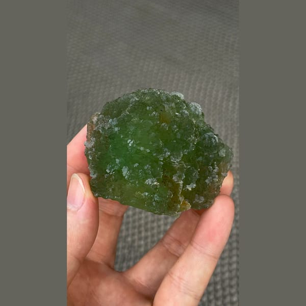 Large stepped apple green fluorite cluster from Henan — alternate view