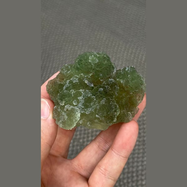 Flat stepped apple green fluorite plate from Henan — complete view
